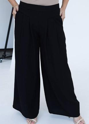 Легкі брюки палаццо