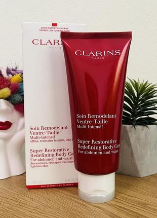 Оригінал підтягувальний крем для області талії і живота clarins super restorative redefining body care оригинал подтянувший крем для тела1 фото