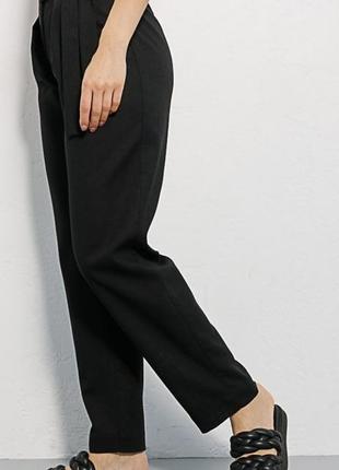 Жіночі лляні штани чорні з асиметричною зав`язкою вгорі 4