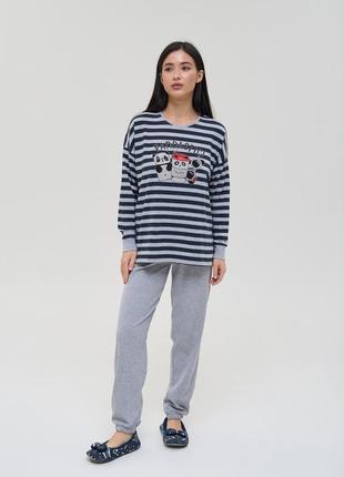 Затишний жіночий комплект у смужку з штанами в рубчик