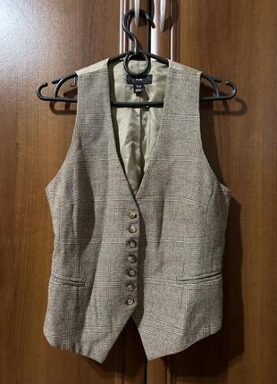 Женская жилетка