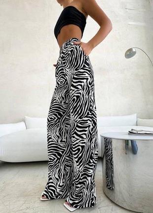 Жіночі брюки на високій посадці2 фото