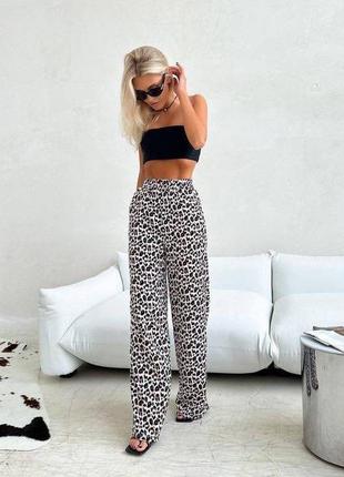 Жіночі брюки на високій посадці3 фото