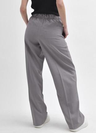 Стильні сірі брюки8 фото