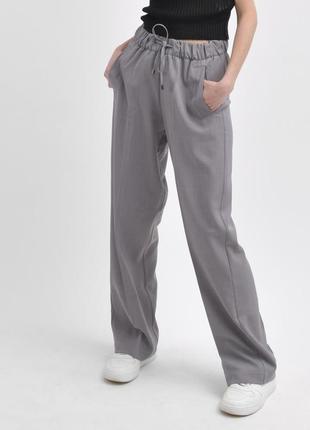 Стильні сірі брюки7 фото