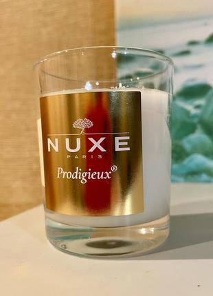 Аромасвеча nuxe prodigieux франция в стеклянном подсвечнике