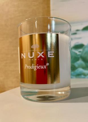 Аромасвеча nuxe prodigieux франция в стеклянном подсвечнике