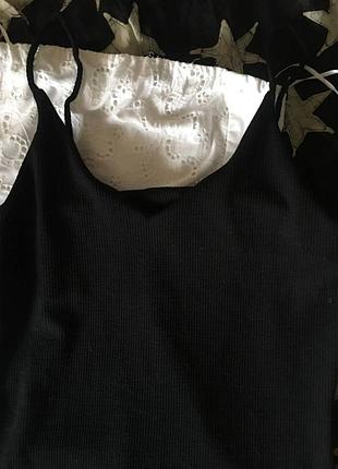 Базова міні сукня "в рубчик" на тонких бретелях6 фото