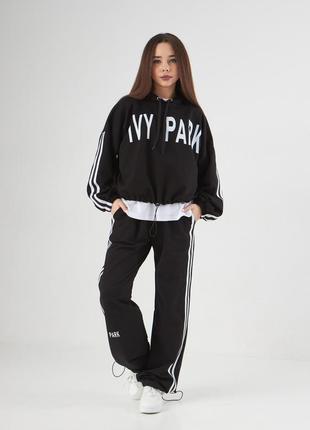 Спортивний костюм для дівчинки 140-164 см чорний трійка