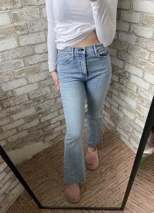 Джинсы клеш с разрезами
