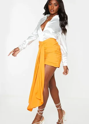 Помаранчева міні спідниця м-л 3