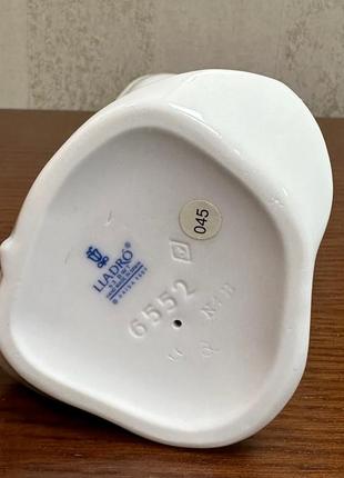 Фарфоровая статуэтка lladro «симпатичная вертушка».