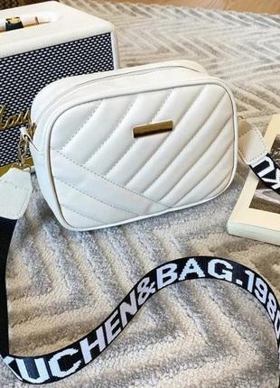 Модна біла жіноча сумочка клатч. жіноча прямокутна мінісумка. маленька сумочка