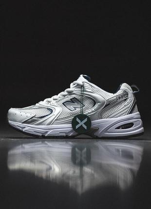 Жіночі кросівки нью беланс 530 / New Balance Lyhythihainen T-Paita Impact Run London Edition Printed