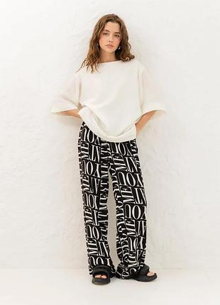 Летний женский костюм свободного кроя с принтованными брюками из натуральной ткани 42-52 размеры разные цвета