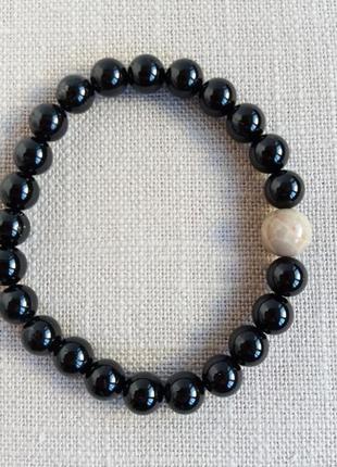 Браслет из черного турмалина и окаменелого коралла петоски d 8мм