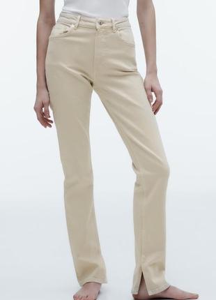 Молочні джинси zara з розрізами