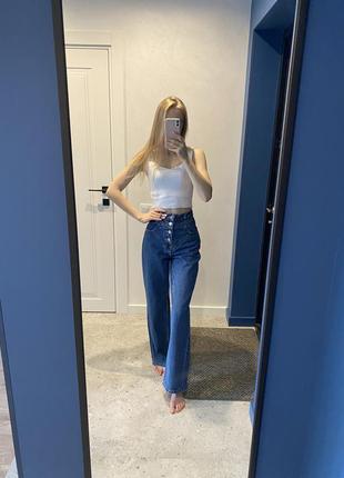 Джинсы темные