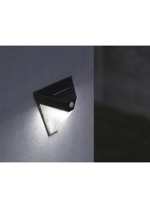 Настінний led світильник із датчиком руху на сонячній батареї чорний livarno home2 фото