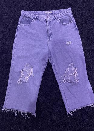 Рваные джинсы