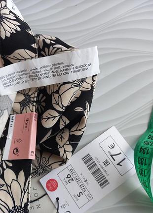 Штани на високій посадці з квітковим принтом4 фото