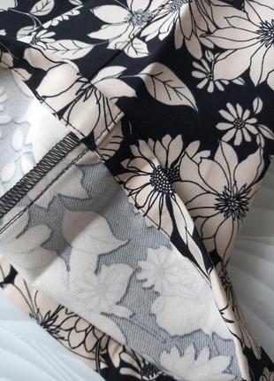 Штани на високій посадці з квітковим принтом8 фото