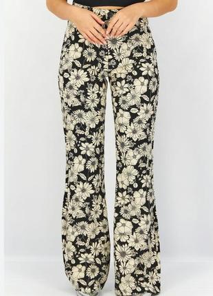 Штани на високій посадці з квітковим принтом