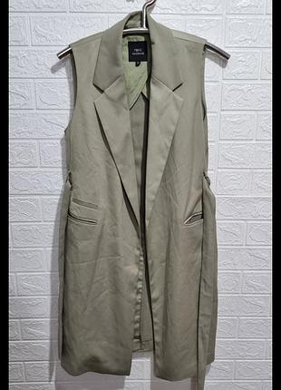 Женская накидка жилетка