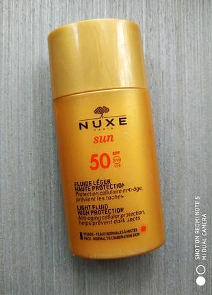 Nuxe/sun.сонцезахисний флюїд.
