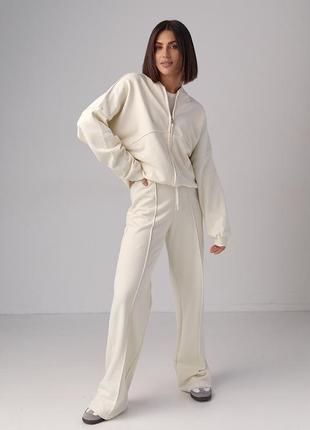 Трикотажний жіночий костюм з бомбером і прямими штанами — молочний колір, l (є розміри)9 фото