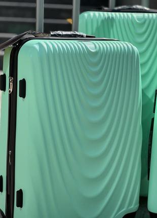 Ударопрочный wings средний чемодан дорожный m на колесах польша 75 литров5 фото