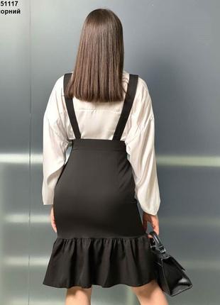 Спідниця довжини міді з воланом на довгих бретелях