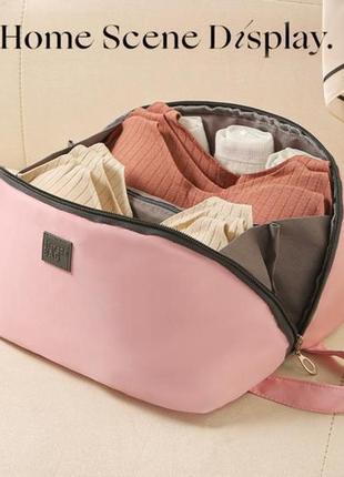 Косметичка жіноча дорожній органайзер для одягу, бюстгальтерів, шкарпеток, storage bag рожевий5 фото