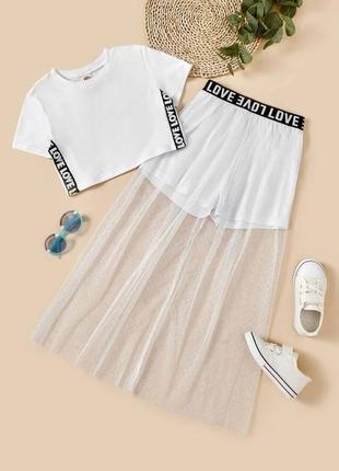 Костюм 
(топ + шорти-спідниця)
