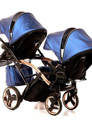 Универсальная коляска для двойни junama fluo duo slim синяя