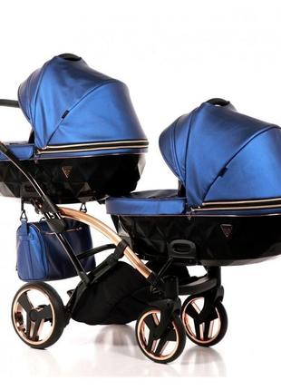 Универсальная коляска для двойни junama fluo duo slim синяя