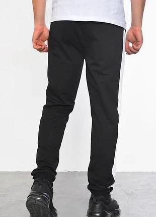 Спортивные штаны на манжетах с полоской