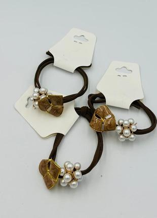 Гумка для волосся з намистинами