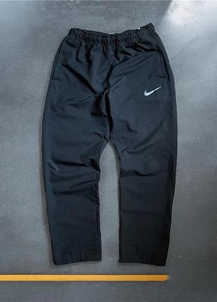 Спортивні штани nike beige dri-fit,free running,tech university,lab,swoosh