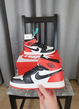 Кроссовки репл. унисекс черные с красным nike air jordan 1 retro. найк аир джордан 1 ретро обувь мужская и1 фото