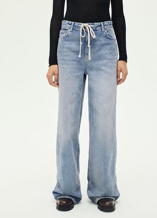 Жіночі джинси wide-leg zara в стилі acne 42 розміру з ефектом брудних плям