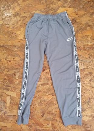Спортивные штаны на флисе nike dri fit с лампасами