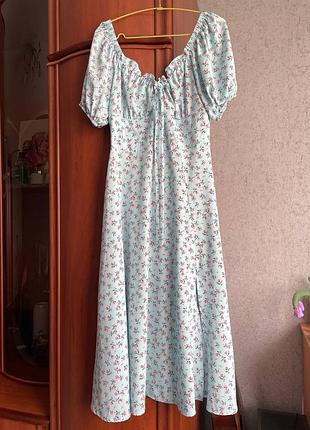 Жіноча сукня міді