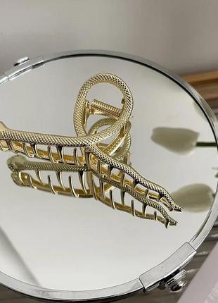 Металевий крабік змійка