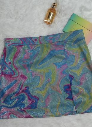 Блискуча міні спідниця з психоделічним принтом у стилі 70-х