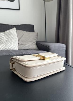 Жіноча біла сумка