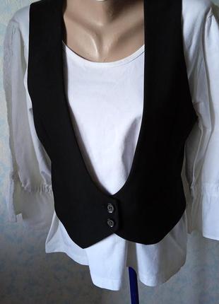 Жилет жіночий фірмовий,офісний,в ідеальному стані.