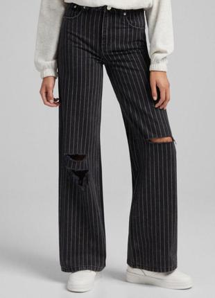 Крутые джинсы в полоску с дирками