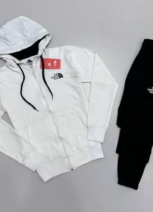 Спортивный костюм унисекс the north face черный, белый2 фото