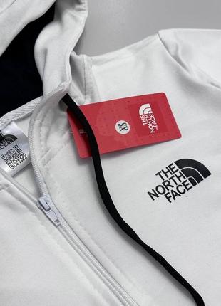 Спортивный костюм унисекс the north face черный, белый4 фото